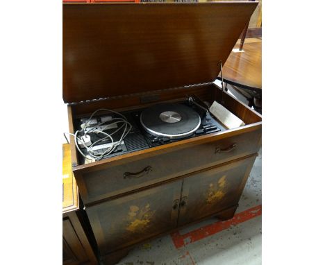 A Garrard belt-drive record and cassette player in a mahogany effect cabinet Condition reports provided on request by email f