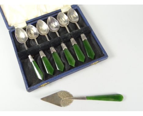 Cased set of six sterling teaspoons with green jade-type handles together with similar silver trowel-shaped slice, the spoons