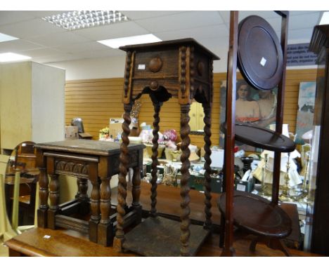 A folding mahogany cake stand, two carved tables, a carved planter stand Condition reports provided on request by email for t
