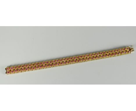 18ct gold two-row ruby bracelet (one stone missing), 29grams Condition reports provided on request by email for this auction 