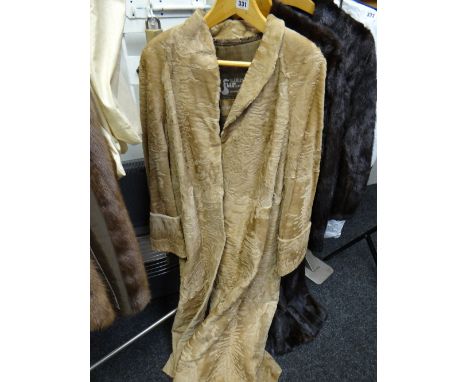 A South African long cloak by Swakara (possibly antelope skin) Condition reports provided on request by email for this auctio