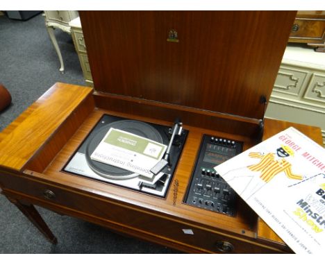 A mid-century Dynatron Garrard gramophone in a reproduction mahogany effect case Condition reports provided on request by ema