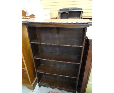 A vintage stained oak four-shelf open bookcase Condition reports provided on request by email for this auction otherwise item