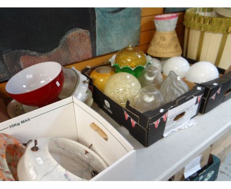 A large parcel of glass and other lamp shades (some as new) together with three framed pictures and a metal tray Condition re