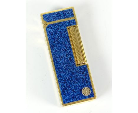 A Dunhill blue mottled enamel and yellow metal gas cigarette lighter Condition reports provided on request by email for this 