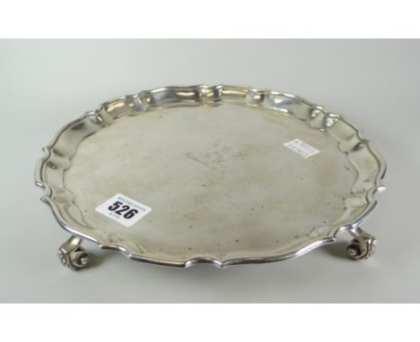Silver pie-crust edge salver raised on four scroll feet, Glasgow 1919, maker's initials R&amp;W S, marked Sorely Silversmiths