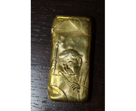 Victorian brass vesta case embossed with medieval style figures and in set with a compass