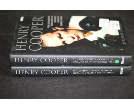 Edwards [Robert], two copies of Henry Cooper, both first editions and both signed by Sir Henry Cooper