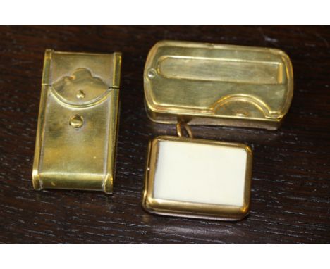 Three late Victorian/early 20th century brass vesta cases, one with miniature portrait slide