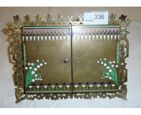 Brass 3 fold photograph frame with inlaid enamel decoration