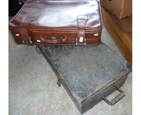 Selection of suitcases and a tin trunk