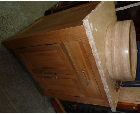 Light oak sink unit with marble top and basin