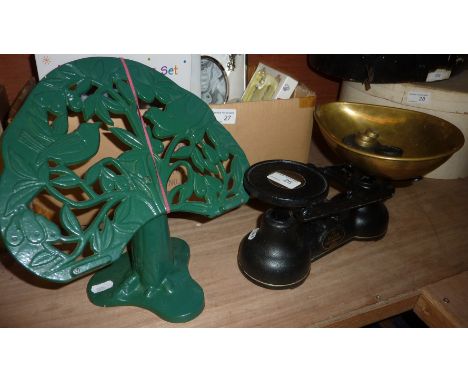 Set of scales and a cast book stand