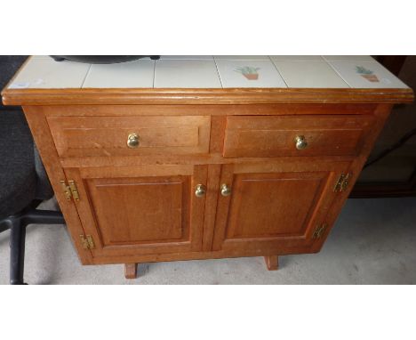 Light oak tile top cabinet with 2 drawers above 2 cupboard doors