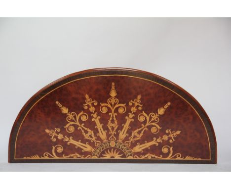 A modern inlaid burr walnut semi-circular panel, decorated with a radiating foliate design, formerly a console table top, 56c