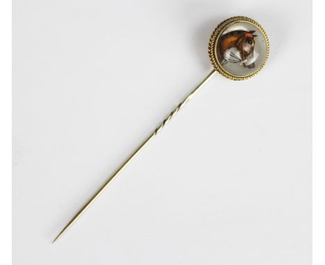 Horse racing interest - a Victorian yellow metal and Essex crystal stick pin, decorated with the head of Lord Lyon and title 