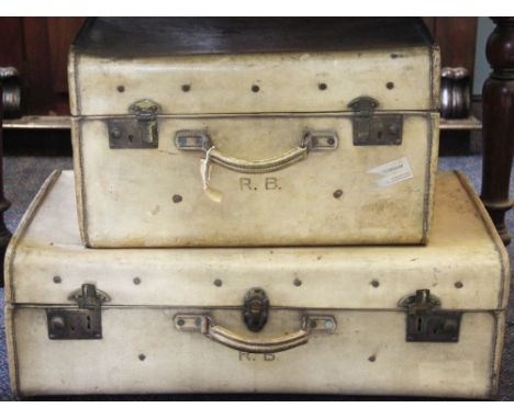 Two vellum travelling cases, each initialled R.G, 50.5cm x 71cm, a painted pine trunk, circa 1900, with iron side handles, 48