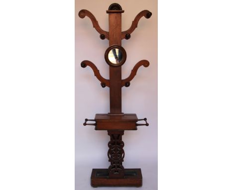 A late Victorian mahogany hall stand, with mirror back and box shelf, on rectangular base, 99cm H (as found)