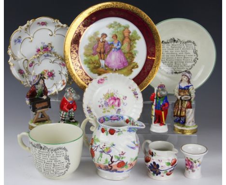 A pair of continental porcelain figures of a boy organ grinder and monkey and a girl with a tambourine, 14cm, a pair of moder