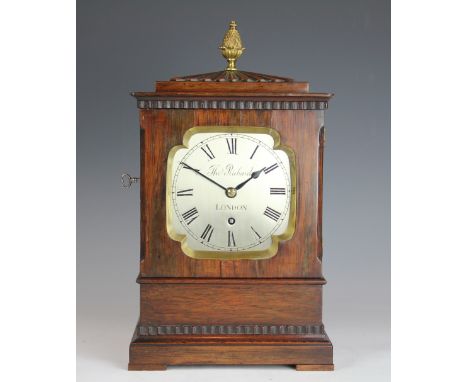 A Regency rosewood cased fusee mantel clock, with gilt brass pineapple finial, above a silvered dial signed Thomas Richards L