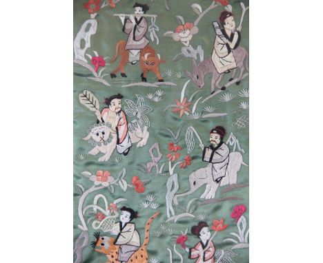 A Chinese silk work picture of children on animals, 63cm x 32.5cm, a picture decorated with geisha in a landscape against a b