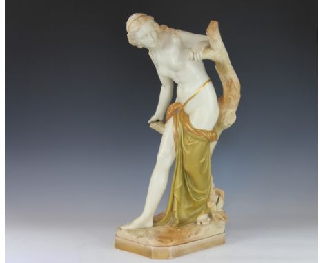 A large Royal Worcester figure of 'The Bather Surprised' after the original by Sir Thomas Brock, the semi-draped nude decorat