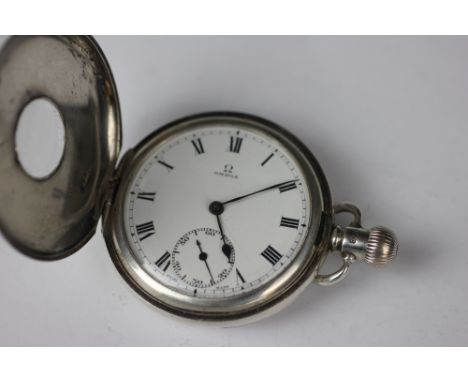 A silver Omega half hunter pocket watch, Birmingham 1927, the cover enclosing white enamel dial with black Roman numerals and