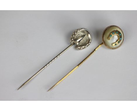 A Victorian yellow metal and mother of pearl stick pin, mounted with a horse shoe, set with seven turquoise stones, 8cm, with