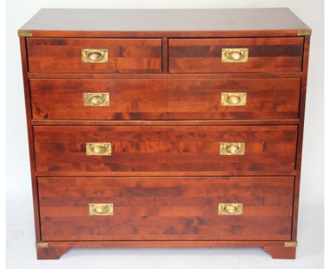 A modern stained beech campaign style brass bound chest, purchased from Laura Ashley, with two short and three graduated long