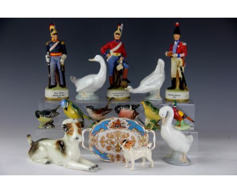 A Goebels model of a recumbent terrier, a Beswick terrier, three Nao Geese, four Beswick bird models, two other birds, three 