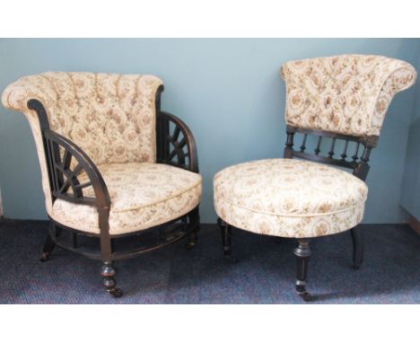 A Victorian Aesthetic ebonised salon tub chair, with button back on turned legs along with a similar nursing chair (2) 