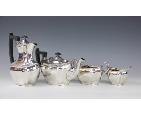 A silver four piece tea service, Viner's Ltd, Sheffield 1922, of oval cusped form, teapot, 16cm high, 21ozt, hot water jug, 2