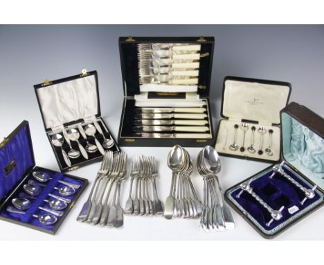 A collection of silver plated flat ware, to include; a selection of silver plated fiddle pattern flatware, eleven forks, twel