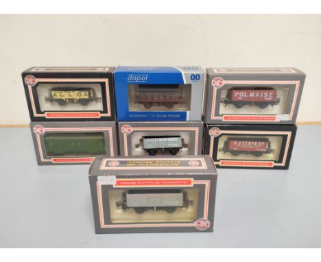 Seven boxed OO gauge Dapol model carriages including LNWR Gunpowder Van Weathered 4F-013-0041 and Utility Van Southern Region