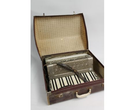 Cased Geraldo accordion in fitted case