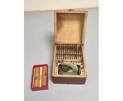 Watchmakers Tools: Vintage Favorite staking set in green enamel paint finish with a selection of anvils and punches also two 