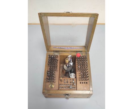 Watchmakers Tools: Vintage Japanese Meikosha (MKS) staking set in wooden case with a selection of anvils and punches 