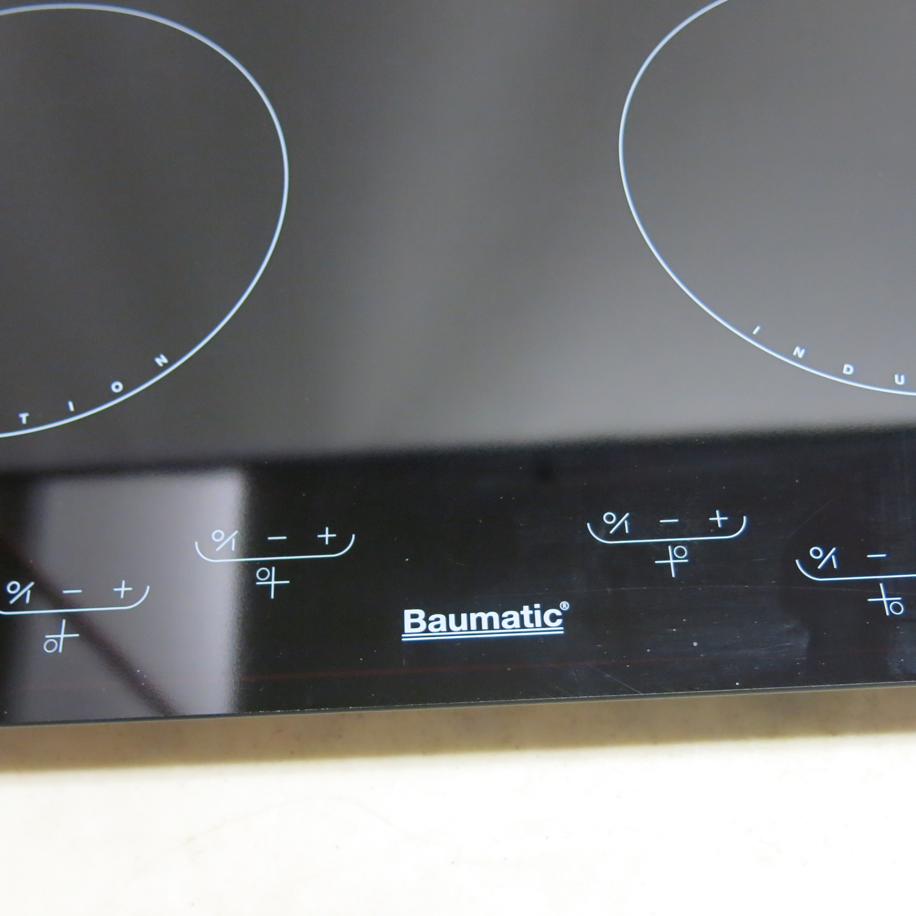 Baumatic Glass 4 Ring Induction Hob, Model BH42/1. Size 58cm x 51cm. New/Ex Display.