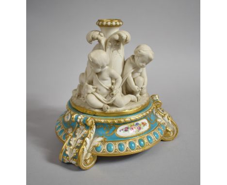 A Continental Figural Parian Candlestick Base of Circular Form Having Cherubs on Turquoise Glazed Porcelain Circular Plinth w