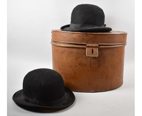 A Vintage Oval Hat Tin Containing Two Bowler Hats, 46cm wide 