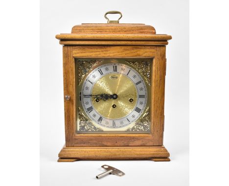 A Modern Oak Cased Westminster Chime Mantle Clock by Ridgeway, 36cm high 