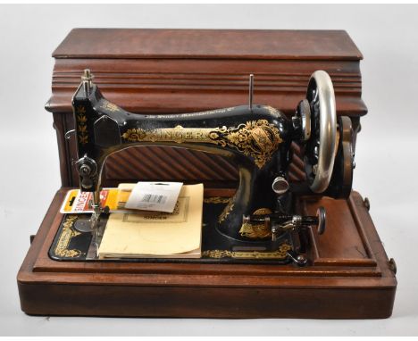 A Vintage Mahogany Cased Manual Singer Sewing Machine 
