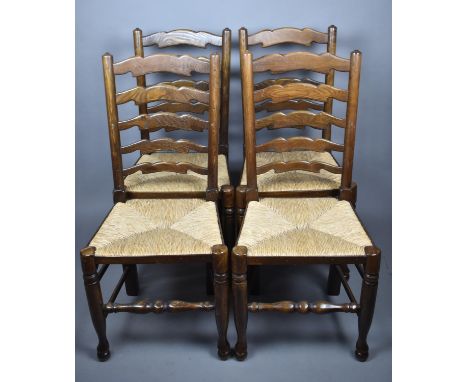 A Set of Four Rush Seated Ladder Back Dining Chairs 