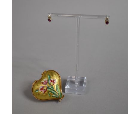 A Pair of 9ct Ruby and Diamond Clip Mounting Earrings in a Limoges Gilt Porcelain Heart Shaped Box 