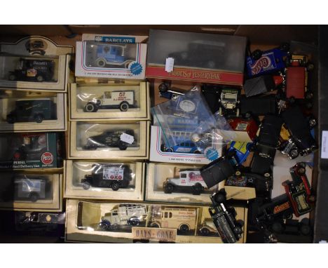 A Collection of Boxes and Loose Diecast Vintage Vans and Cars 