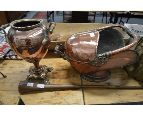 A copper hunting horn, coal bucket and samovar.