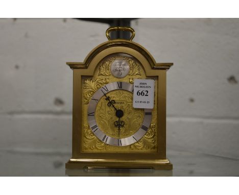 A Swiza brass carriage clock.