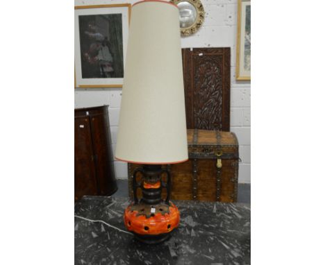 A 1960's-70's large Continental pottery table lamp with shade.