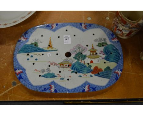 A Spode Chinese style drainer.
