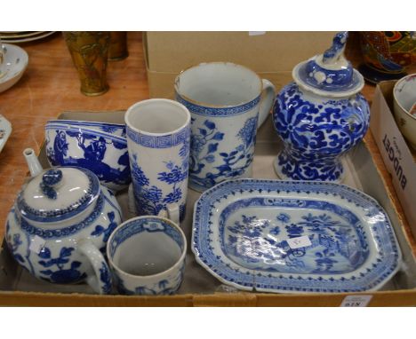 A collection of Chinese blue and white items to include a small dish, tankard, teapot etc.